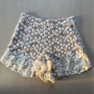 Majorelle tan and white lace shorts